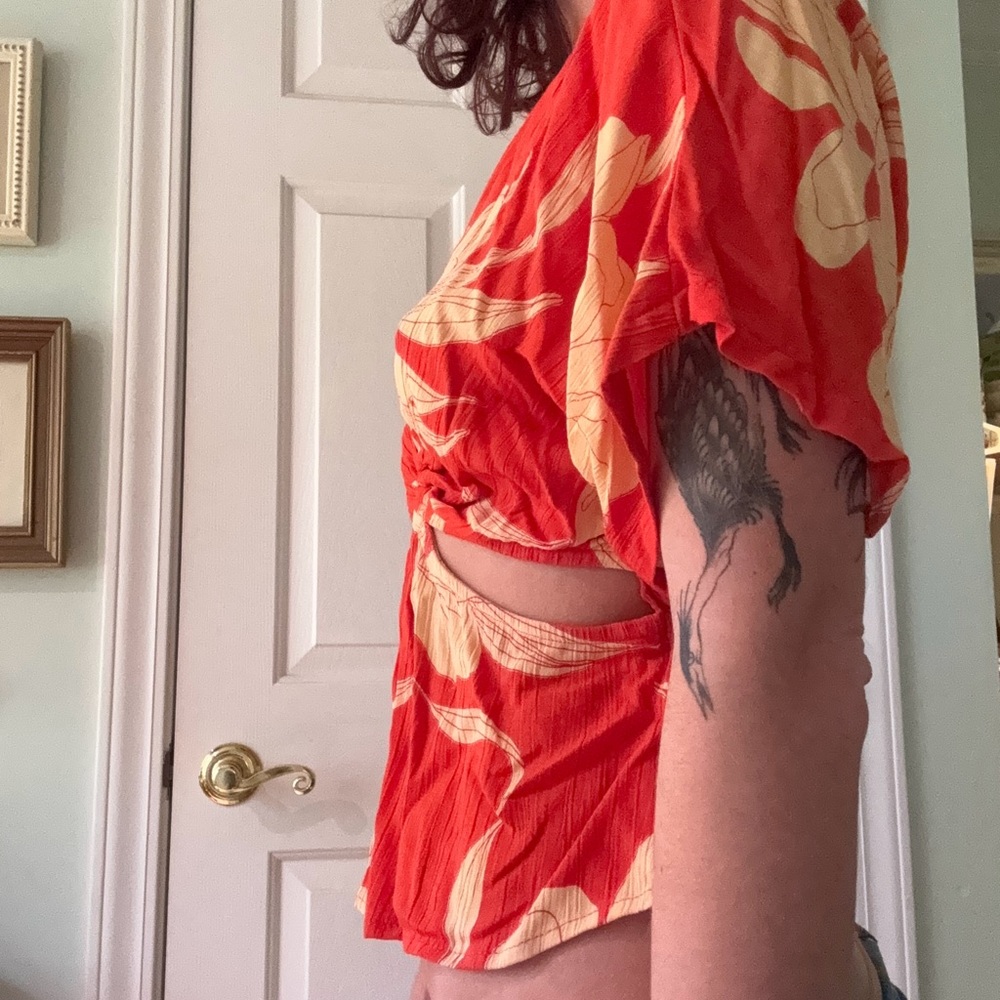 Orange floral top with cutouts (new with tags)